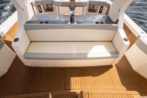 530LXF aft facing seat with rod storage underneath